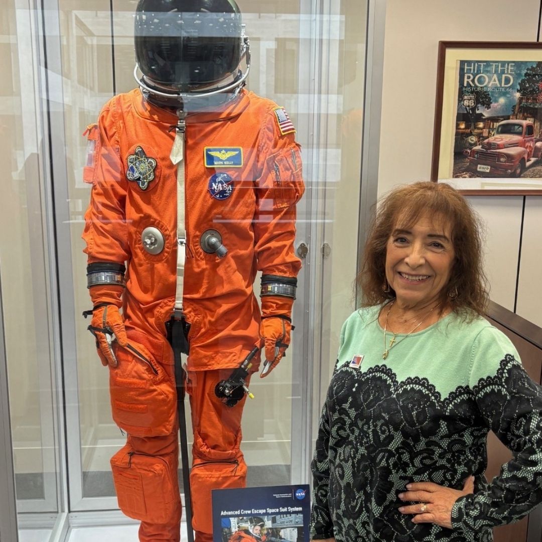 Jacque LaShier with spacesuit of Rep. Mark Kelley-AZ as NASA astronaut.